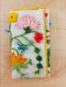 Crewel stitching by Constance Eliassen turned into a pouch by daughter Meredith